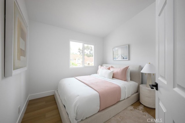 24411 Kings Vw, Laguna Niguel, CA 92677 - bedroom with wood finished floors and lofted ceiling