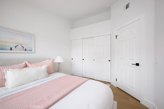 24411 Kings Vw, Laguna Niguel, CA 92677 - bedroom featuring wood finished floors and a closet