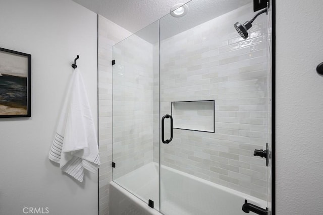 24411 Kings Vw, Laguna Niguel, CA 92677 - bathroom with shower / bath combination with glass door and a textured ceiling
