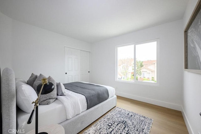 24411 Kings Vw, Laguna Niguel, CA 92677 - bedroom with light wood finished floors and a closet