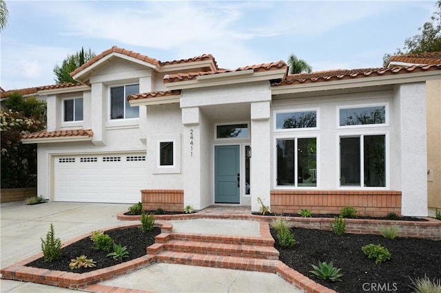 24411 Kings Vw, Laguna Niguel, CA 92677 - mediterranean / spanish home with a garage, stucco siding, concrete driveway, and a tiled roof