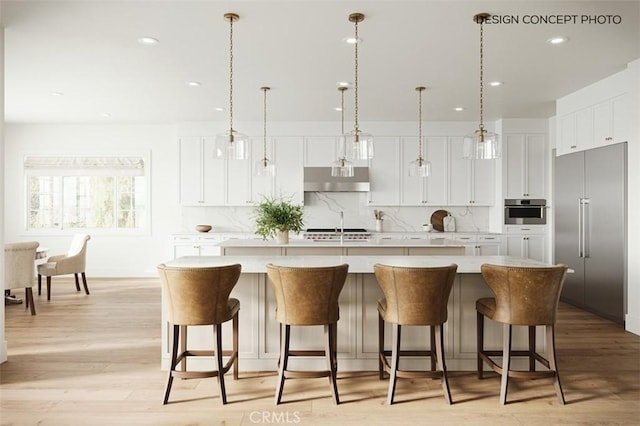 1827 9th St, Manhattan Beach, CA 90266 - kitchen with recessed lighting, stainless steel appliances, light countertops, white cabinets, and backsplash