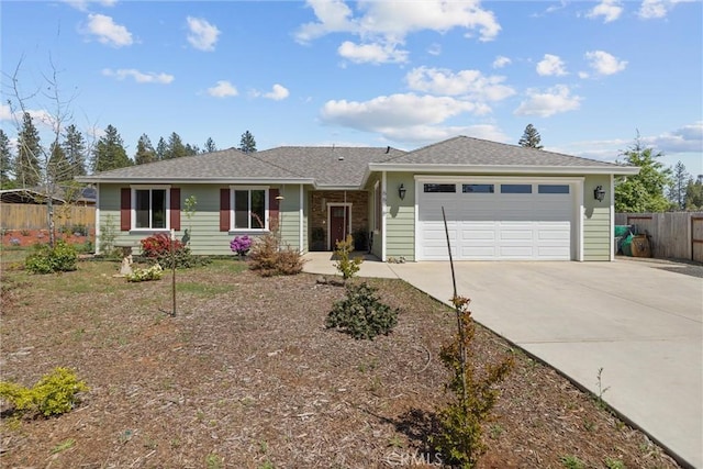 ranch-style house with driveway, roof with shingles, a garage, and fence