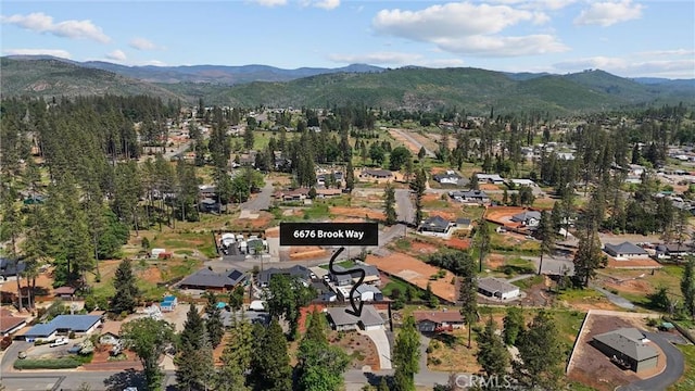 aerial view featuring a mountain view and a residential view