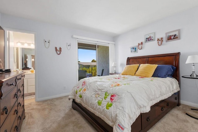3555 Boussock Ln, Oceanside, CA 92057 - bedroom featuring access to exterior, light colored carpet, and connected bathroom