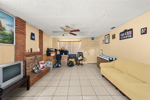 12597 Jalepeno Ave, Chino, CA 91710 - living area with ceiling fan, tile patterned floors, and a textured ceiling