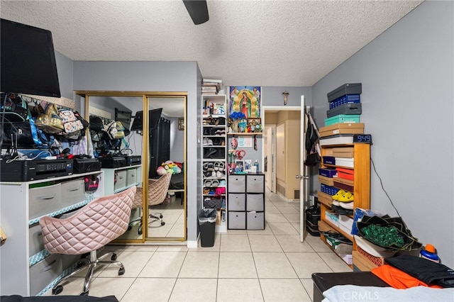 12597 Jalepeno Ave, Chino, CA 91710 - office space with tile patterned floors, a ceiling fan, and a textured ceiling