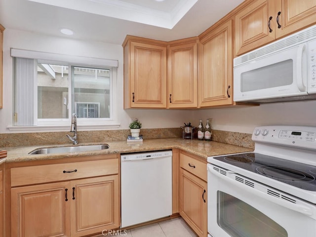 2390 Via Mariposa W Unit 2E, Laguna Woods, CA 92637 - kitchen featuring a sink, light brown cabinets, light tile patterned floors, a raised ceiling, and white appliances