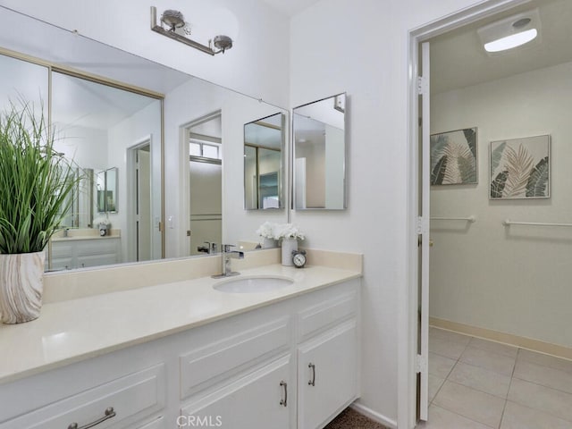 2390 Via Mariposa W Unit 2E, Laguna Woods, CA 92637 - bathroom with tile patterned flooring, vanity, and baseboards