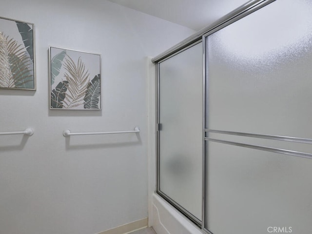 2390 Via Mariposa W Unit 2E, Laguna Woods, CA 92637 - bathroom with shower / bath combination with glass door