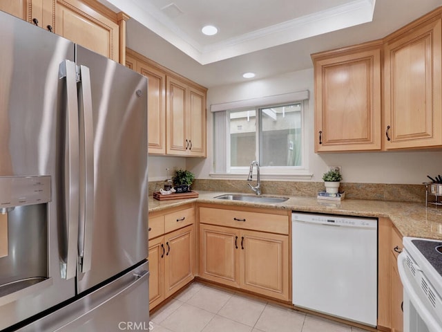 2390 Via Mariposa W Unit 2E, Laguna Woods, CA 92637 - kitchen with light brown cabinetry, white appliances, crown molding, and a sink