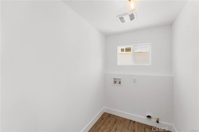 11445 Saticoy St, North Hollywood, CA 91605 - laundry area featuring washer hookup, baseboards, hookup for a gas dryer, and wood finished floors