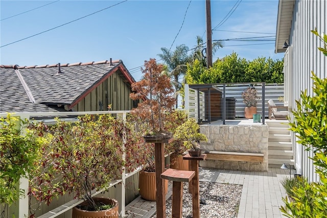 567 Flora St, Laguna Beach, CA 92651 - view of side of property with a shingled roof