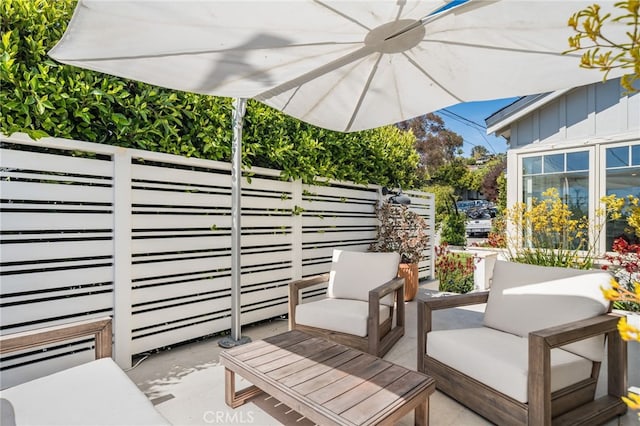 567 Flora St, Laguna Beach, CA 92651 - view of patio with an outdoor hangout area and ceiling fan