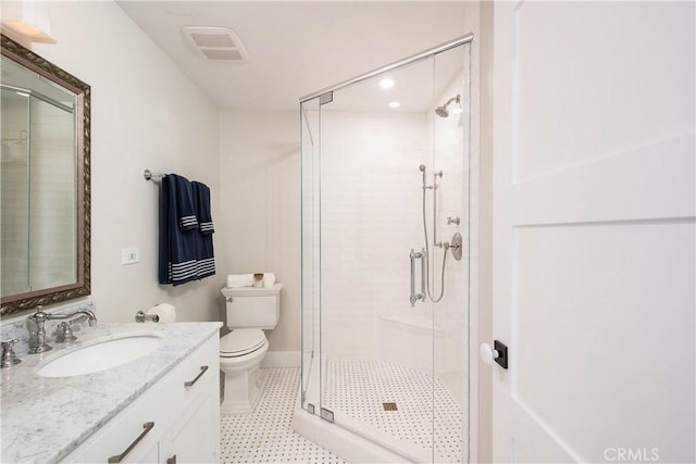 567 Flora St, Laguna Beach, CA 92651 - bathroom featuring visible vents, a stall shower, toilet, recessed lighting, and vanity