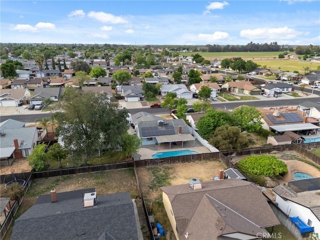 1045 Clover Ln, Hanford, CA 93230 - aerial perspective of suburban area featuring a pool
