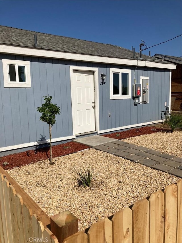 property entrance featuring fence