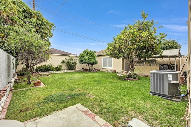 7518 Loch Alene Ave, Pico Rivera, CA 90660 - view of yard featuring central AC and a fenced backyard