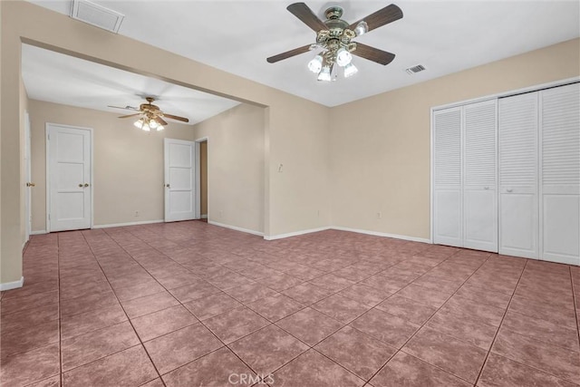 7518 Loch Alene Ave, Pico Rivera, CA 90660 - unfurnished living room featuring tile patterned floors, visible vents, and ceiling fan