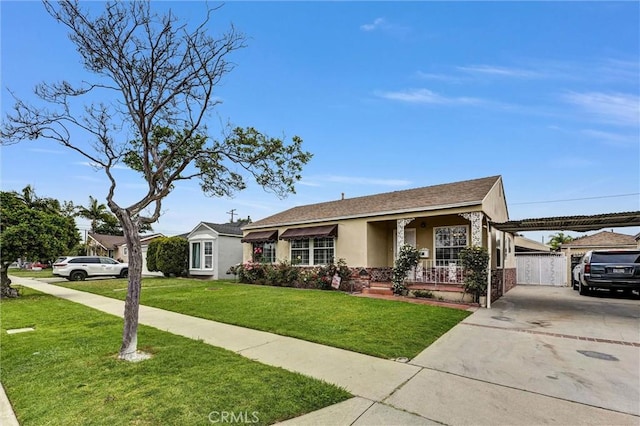 7518 Loch Alene Ave, Pico Rivera, CA 90660 - view of front of house featuring concrete driveway, covered porch, stucco siding, a front lawn, and brick siding