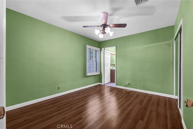 7518 Loch Alene Ave, Pico Rivera, CA 90660 - unfurnished bedroom featuring a closet, ceiling fan, visible vents, baseboards, and wood finished floors