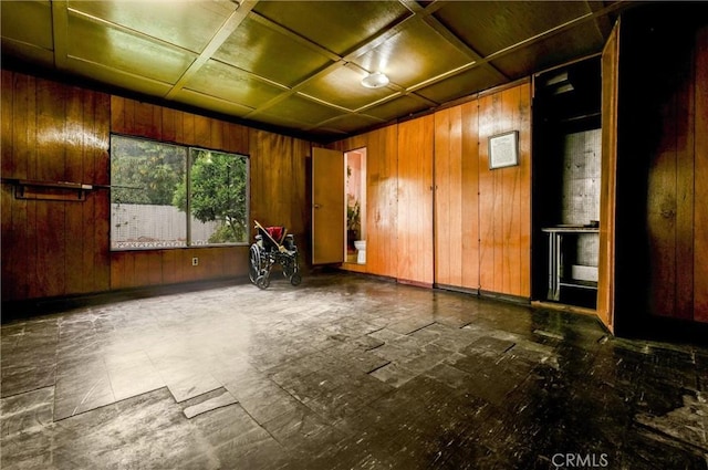 7518 Loch Alene Ave, Pico Rivera, CA 90660 - misc room with tile patterned floors and wooden walls