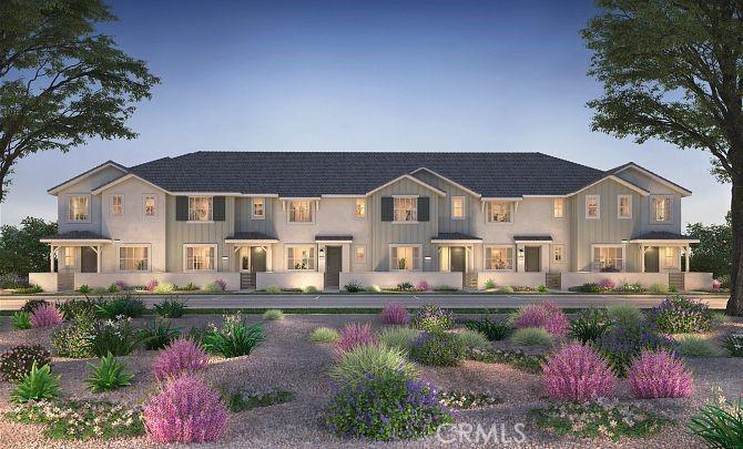 4016 E Lily Paseo Unit 120, Ontario, CA 91761 - view of front of home featuring board and batten siding