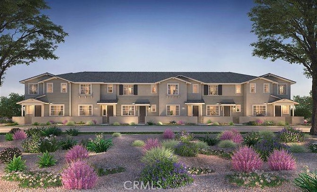 4016 E Lily Paseo Unit 120, Ontario, CA 91761 - view of front of property featuring stucco siding