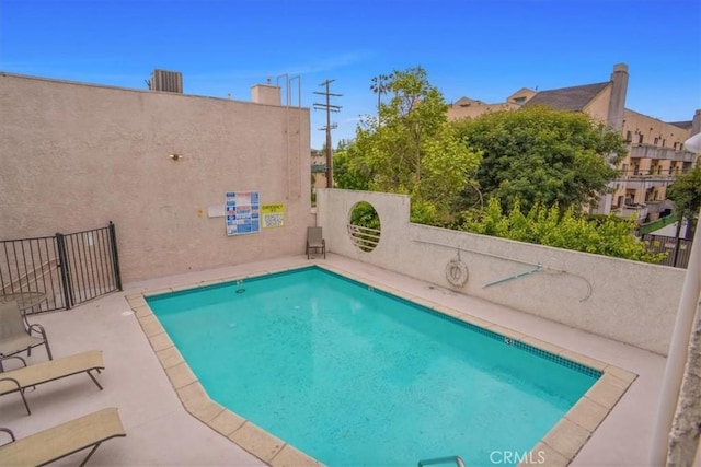 community pool with fence