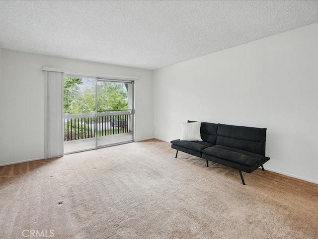 23515 Lyons Ave Unit 286, Valencia, CA 91355 - living area with carpet floors and a textured ceiling