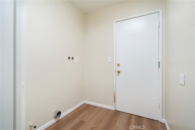 432 W Caldwell Ct, San Dimas, CA 91773 - laundry area featuring gas dryer hookup, wood finished floors, and baseboards