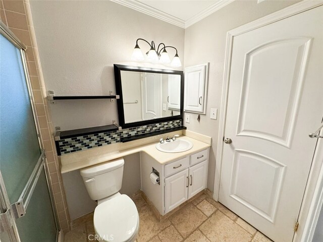 full bath featuring vanity, stone tile floors, toilet, an enclosed shower, and ornamental molding