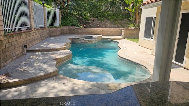 24722 Bracken Ln, Stevenson Ranch, CA 91381 - view of pool featuring fence, a patio, and a pool with connected hot tub