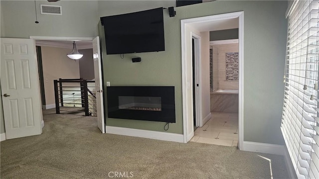 24722 Bracken Ln, Stevenson Ranch, CA 91381 - interior space featuring carpet flooring, baseboards, and visible vents