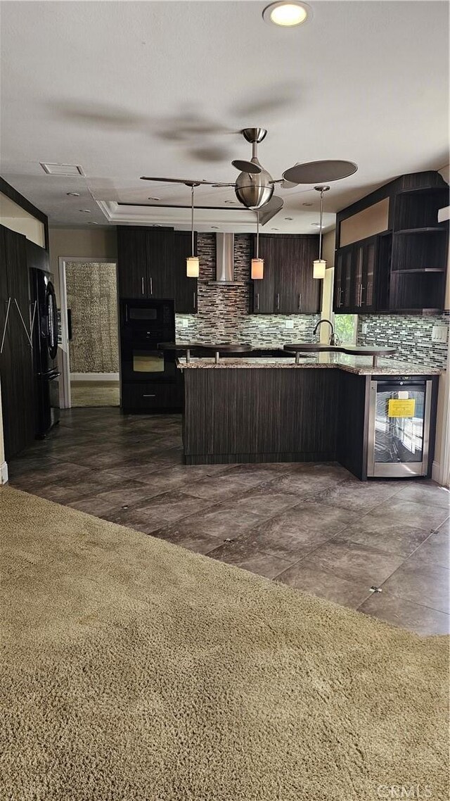 24722 Bracken Ln, Stevenson Ranch, CA 91381 - kitchen with a ceiling fan, wall chimney exhaust hood, wine cooler, and backsplash