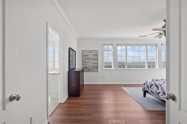 20704 Campania Ln, Porter Ranch, CA 91326 - sitting room featuring wood finished floors, a ceiling fan, ornamental molding, and baseboards