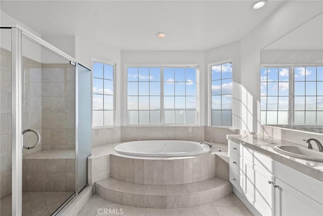 20704 Campania Ln, Porter Ranch, CA 91326 - full bathroom featuring recessed lighting, vanity, tile patterned floors, a stall shower, and a garden tub
