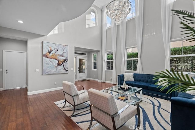 20704 Campania Ln, Porter Ranch, CA 91326 - living area featuring recessed lighting, a chandelier, hardwood / wood-style floors, baseboards, and a high ceiling