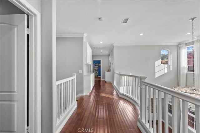 20704 Campania Ln, Porter Ranch, CA 91326 - hallway featuring recessed lighting, dark wood-style flooring, an upstairs landing, visible vents, and ornamental molding