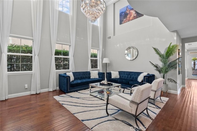 20704 Campania Ln, Porter Ranch, CA 91326 - living room featuring a towering ceiling, hardwood / wood-style flooring, and plenty of natural light