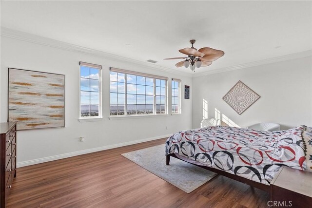20704 Campania Ln, Porter Ranch, CA 91326 - bedroom featuring visible vents, baseboards, ornamental molding, wood finished floors, and a ceiling fan