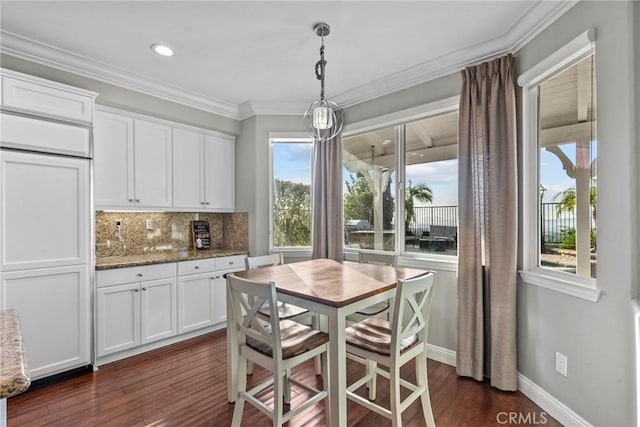 20704 Campania Ln, Porter Ranch, CA 91326 - dining area featuring dark wood finished floors, baseboards, crown molding, and recessed lighting