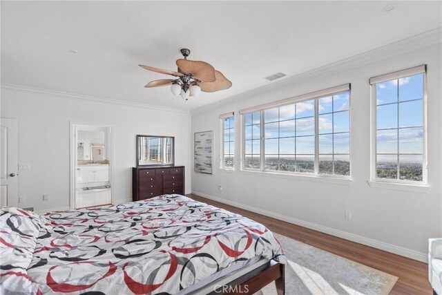 20704 Campania Ln, Porter Ranch, CA 91326 - bedroom with wood finished floors, connected bathroom, ornamental molding, baseboards, and visible vents