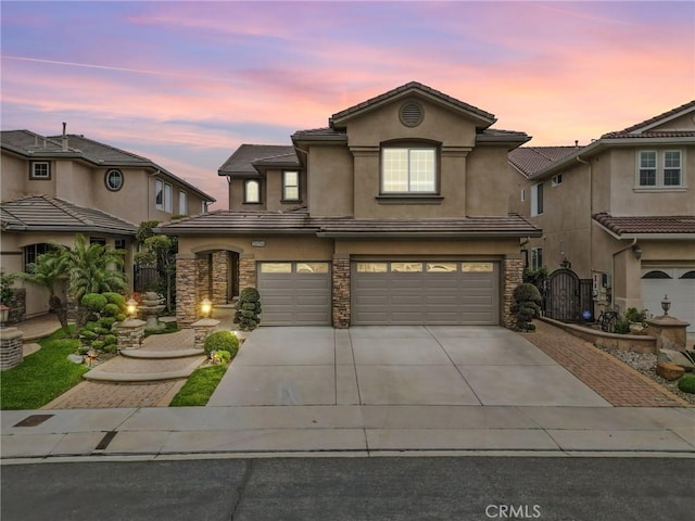 20704 Campania Ln, Porter Ranch, CA 91326 - traditional-style house featuring stucco siding, concrete driveway, stone siding, and a garage