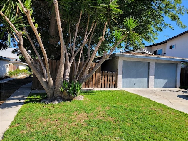 2109 Warfield Ave, Redondo Beach, CA 90278 - view of front facade featuring fence, an attached garage, concrete driveway, and a front yard