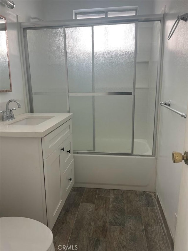 2109 Warfield Ave, Redondo Beach, CA 90278 - full bathroom with vanity, wood finished floors, toilet, and shower / bath combination with glass door