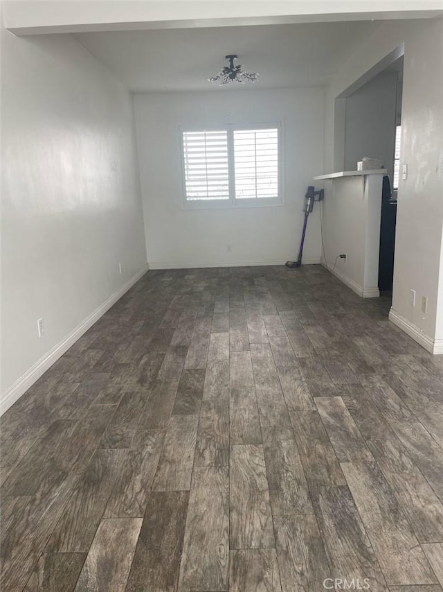 2109 Warfield Ave, Redondo Beach, CA 90278 - unfurnished room featuring baseboards and dark wood-style flooring