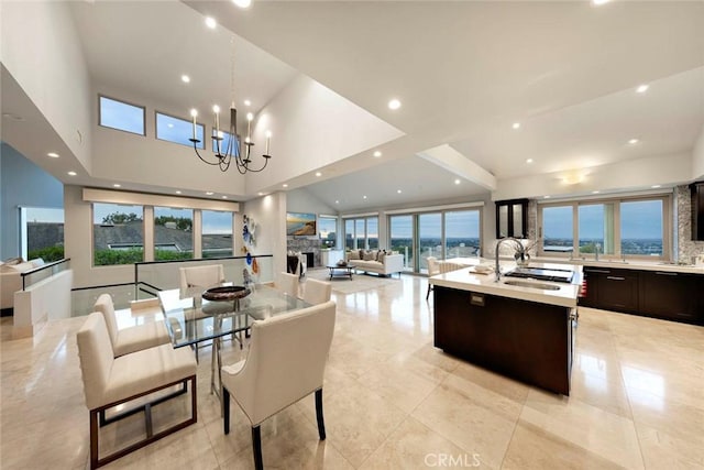 dining space with light tile patterned floors, recessed lighting, and a notable chandelier