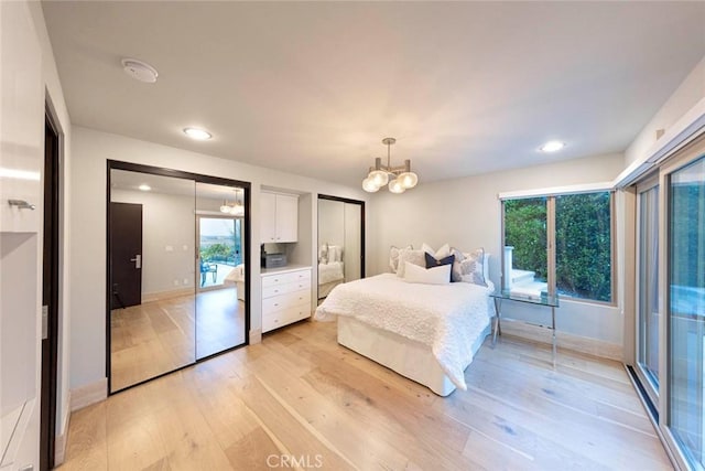 bedroom with baseboards, recessed lighting, a notable chandelier, and light wood-style flooring