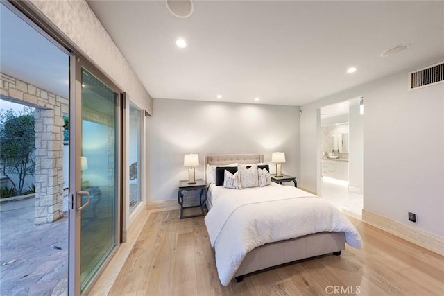 bedroom featuring visible vents, baseboards, recessed lighting, light wood finished floors, and ensuite bath